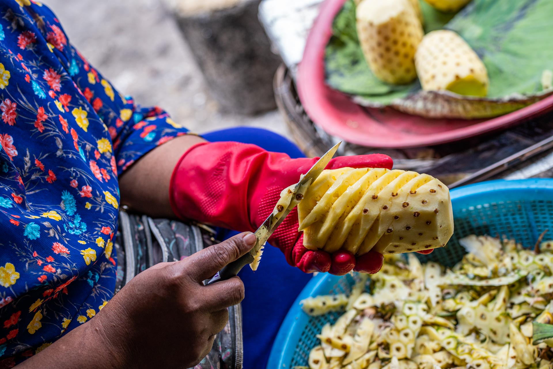 /fm/Files//Pictures/Ido Uploads/Asia/cambodia/All/Battambang - Women Cutting Pineapple Market.jpg